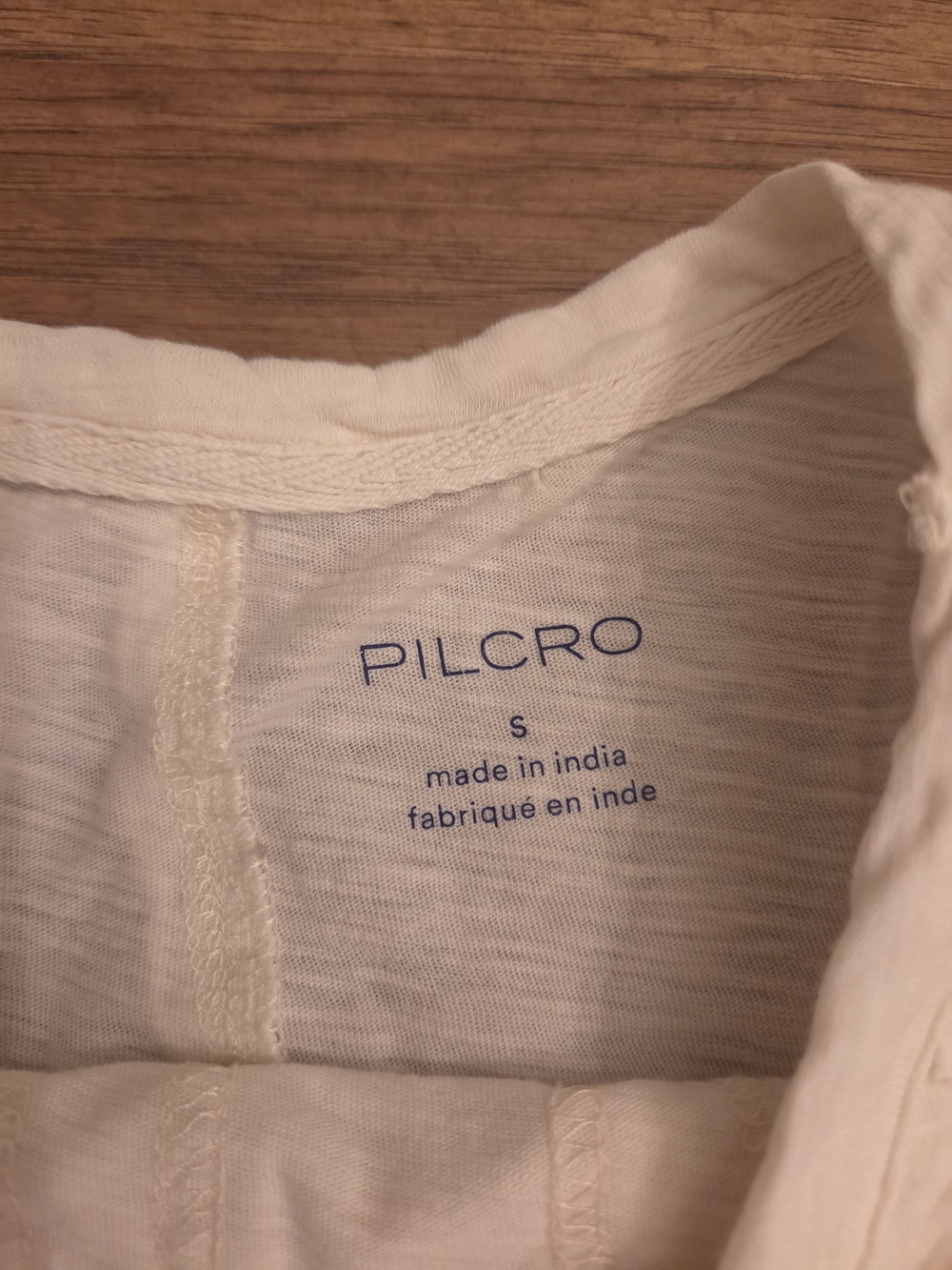Anthropologie Pilcro Smocked Peplum Babydoll Top Cream Size Small